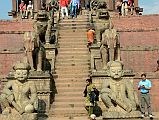 Kathmandu Bhaktapur 06-4 Nyatapola Temple Stairway WithJayamel and Phattu Wrestlers and Pairs Of Elephants, Lions, Beaked Griffons and Godesses Baghini and Singhini 